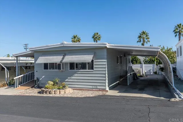 a front view of a house with a porch