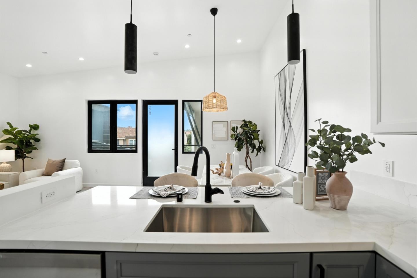 889 McLellan Drive, Unit 302 South San Francisco, CA 94080 - Photo 14 of 29 a kitchen counter with a sink and potted plant