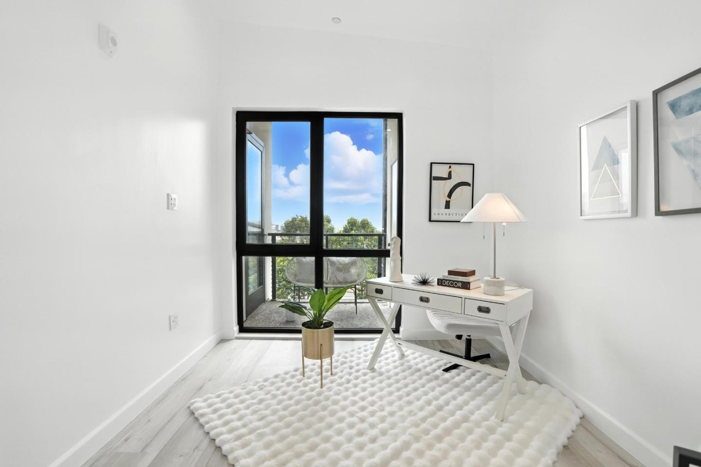 889 McLellan Drive, Unit 302 South San Francisco, CA 94080 - Photo 19 of 29 a living room with furniture and a window