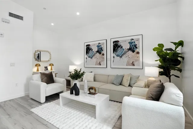 a living room with furniture and a couch