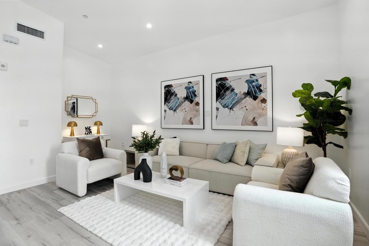 889 McLellan Drive, Unit 302 South San Francisco, CA 94080 - Photo 2 of 29 a living room with furniture and a couch