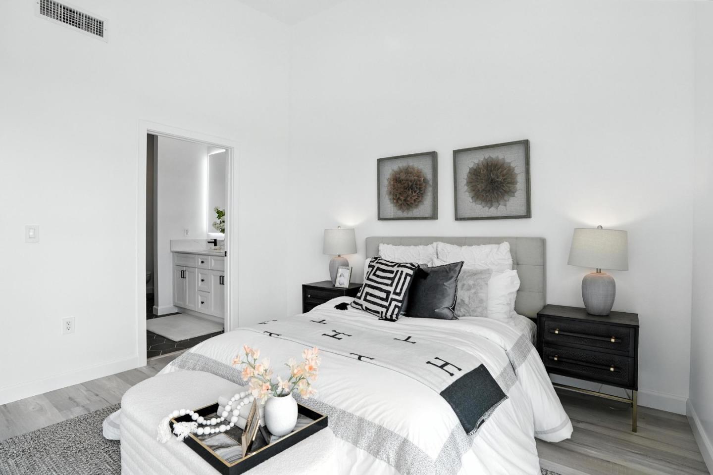 889 McLellan Drive, Unit 302 South San Francisco, CA 94080 - Photo 22 of 29 a bedroom with a bed and a night stand