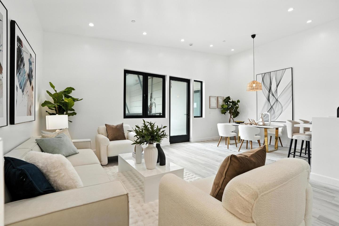 889 McLellan Drive, Unit 302 South San Francisco, CA 94080 - Photo 5 of 29 a living room with furniture and a large window