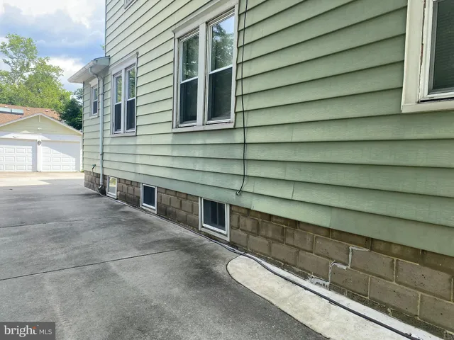 a view of a house with a street