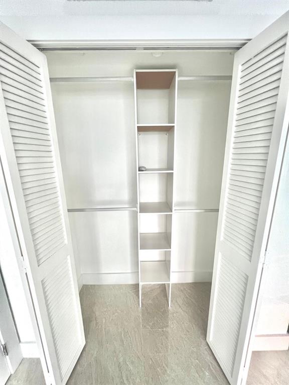 1345 Lincoln Road, Unit 1201 Miami Beach, FL 33139 - Photo 25 of 30 a view of wooden floor in a room