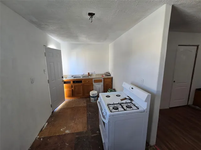 a view of a livingroom from a hallway