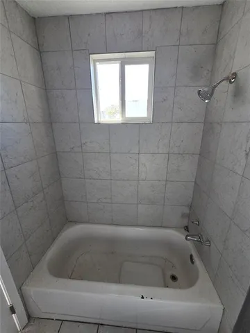 a bathroom with a bathtub