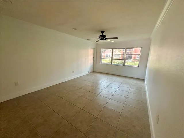 en empty room with windows