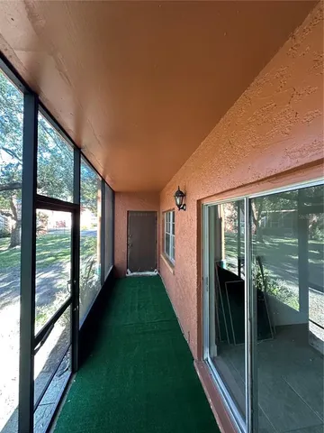 a view of swimming pool with an outdoor space and seating area