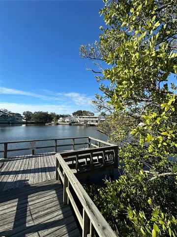 a view of a lake with a big yard