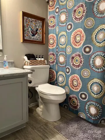 a bathroom with a toilet and sink
