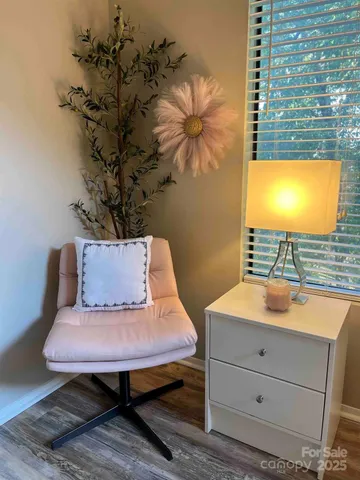 a view of a room with a table and chair
