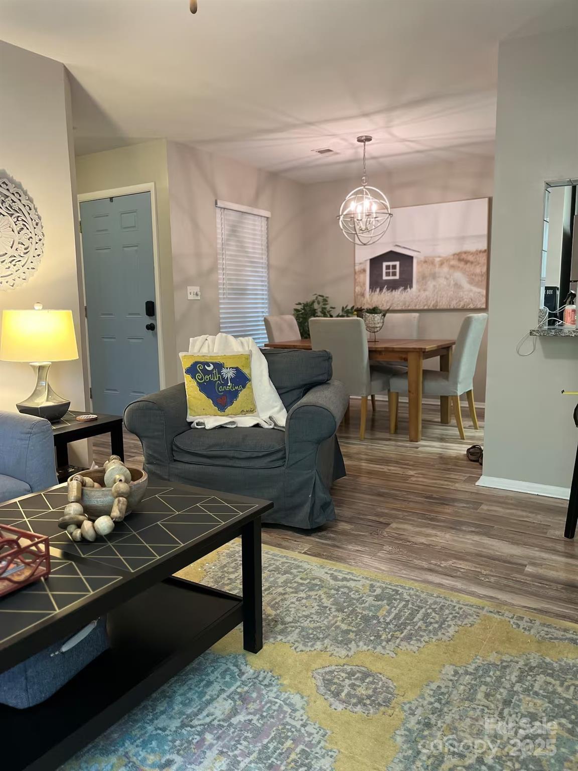 229 Windsor Point Road, Unit 6B Columbia, SC 29223 - Photo 10 of 15 a living room with furniture and a table