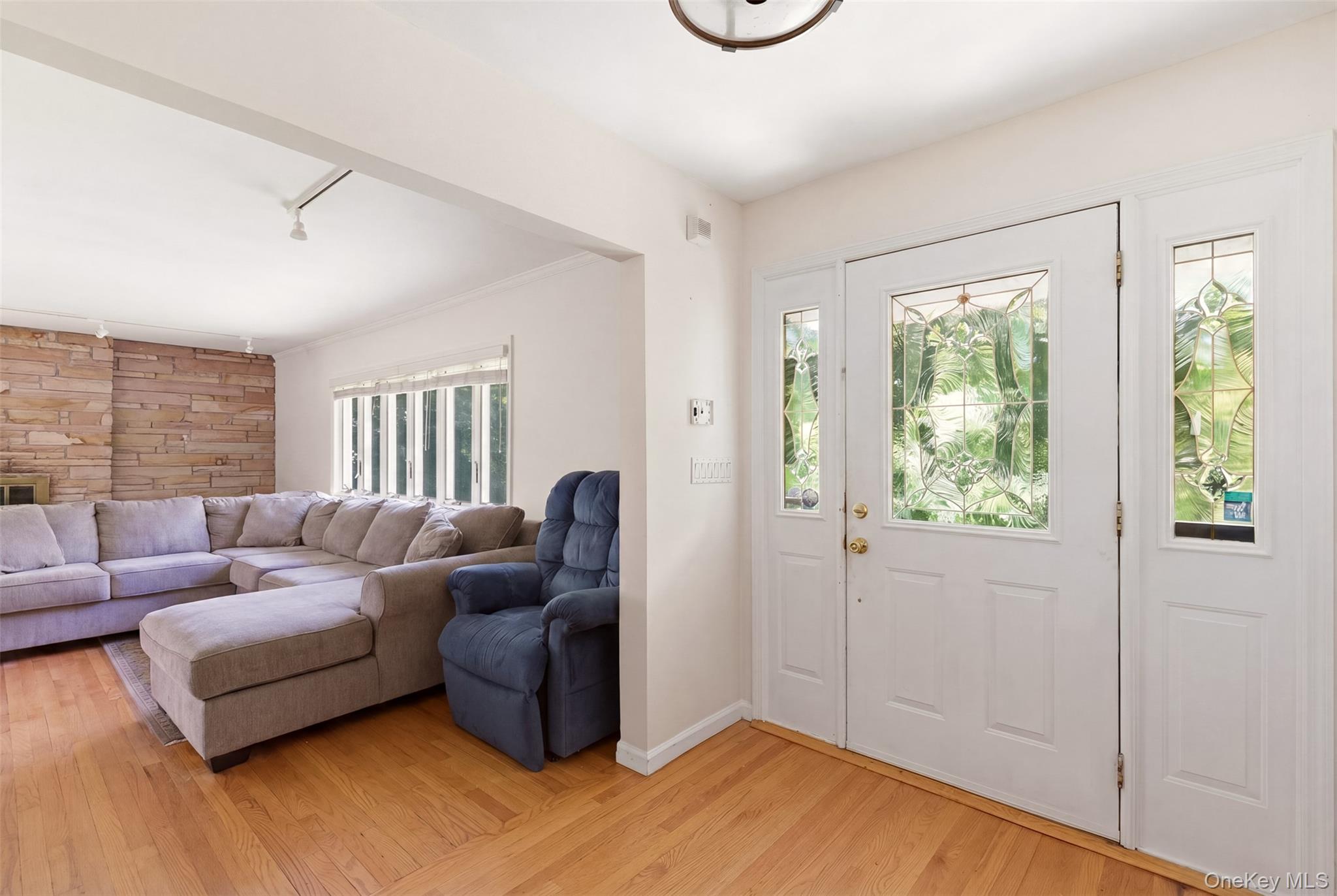 106 Vineyard Road Huntington, NY 11743 - Photo 2 of 25 a living room with furniture and a large window