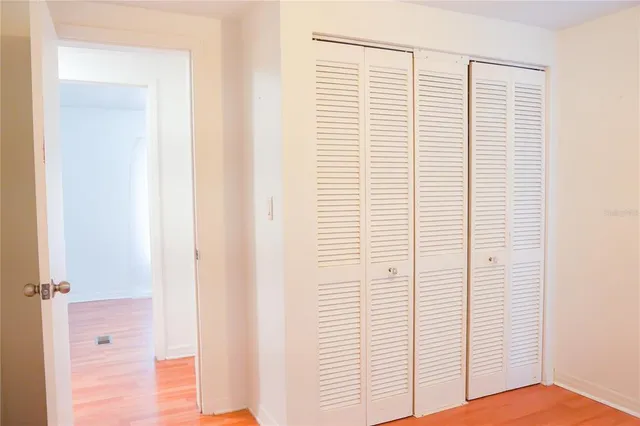 a view of a room that has a window in it