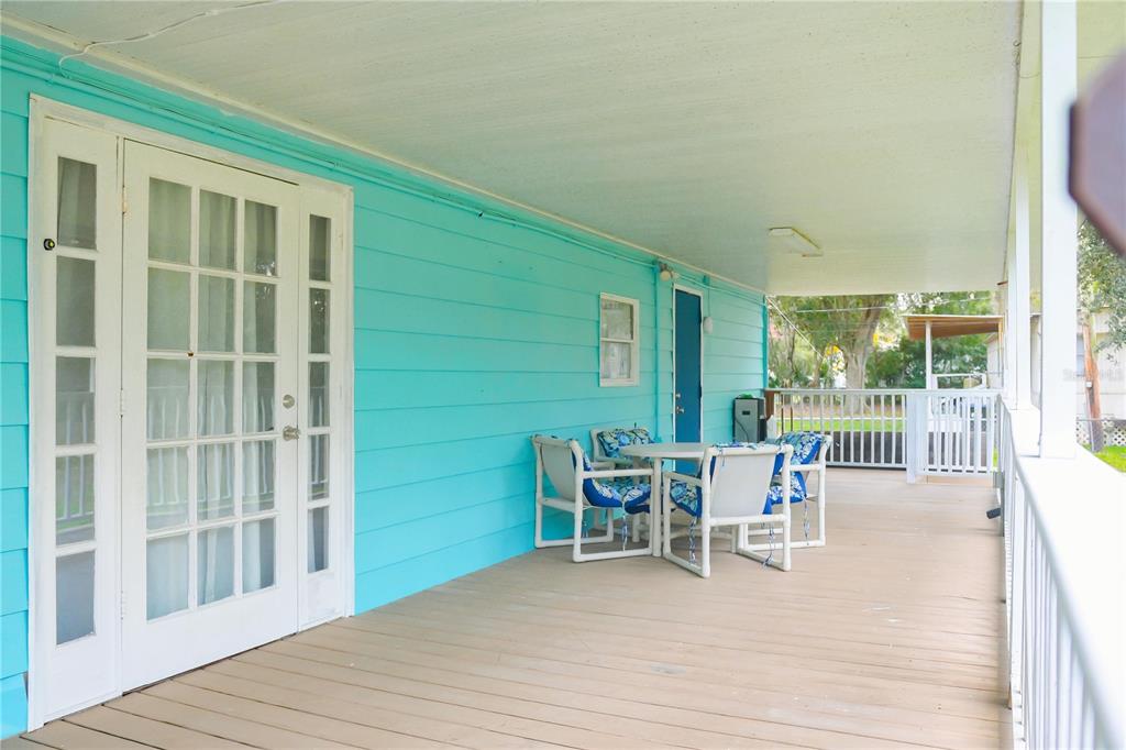 630 Carpenter Road Orlando, FL 32833 - Photo 17 of 23 a dining room with furniture and wooden floor