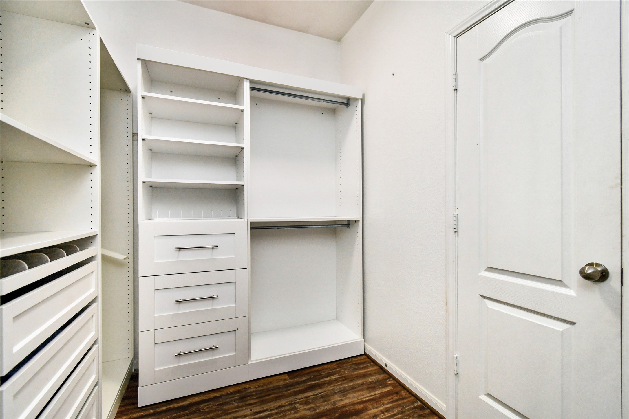 7110 Panther Ridge Drive Spring, TX 77389 - Photo 12 of 25 a view of walk in closet with empty racks