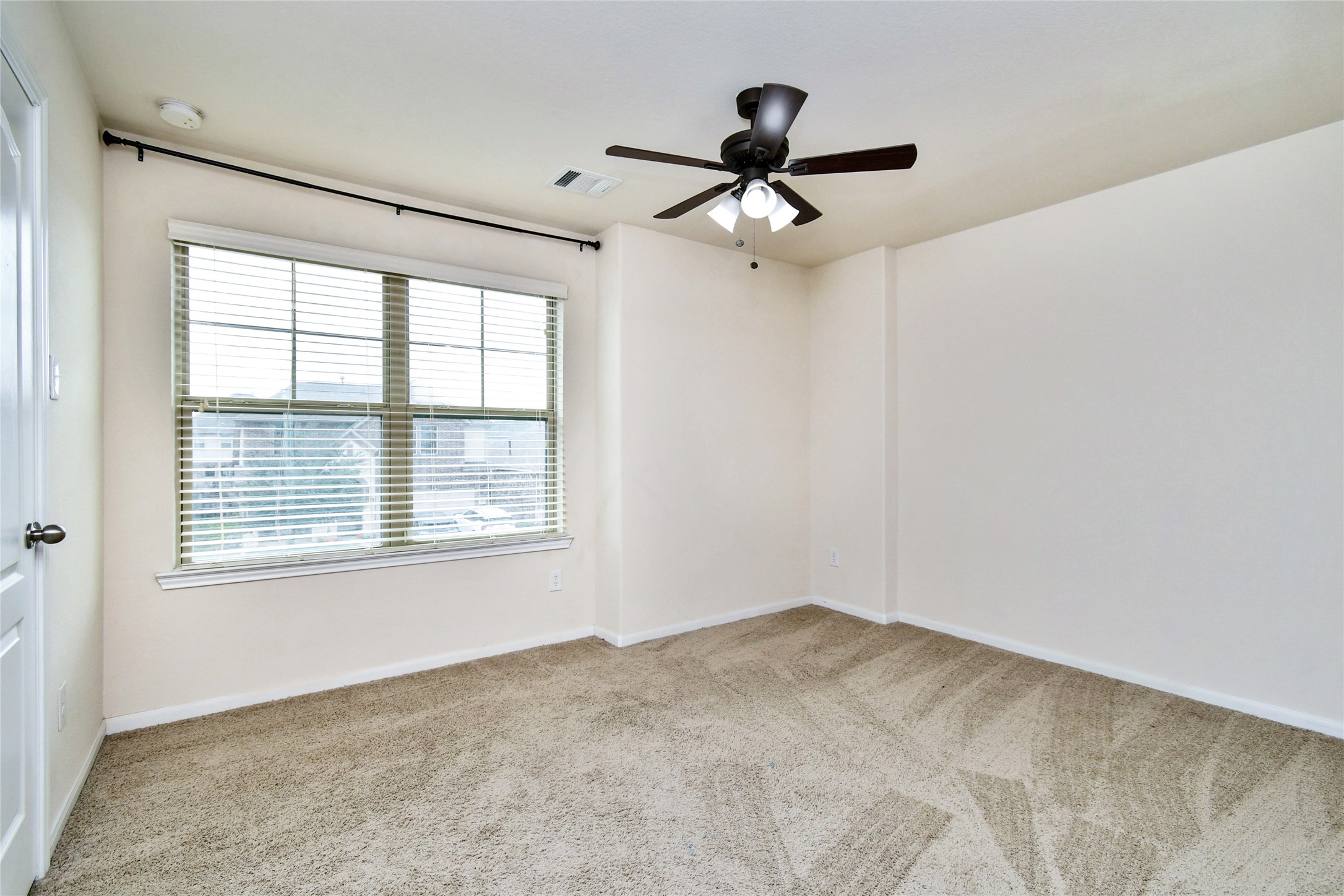 7110 Panther Ridge Drive Spring, TX 77389 - Photo 15 of 24 a view of an empty room with a window