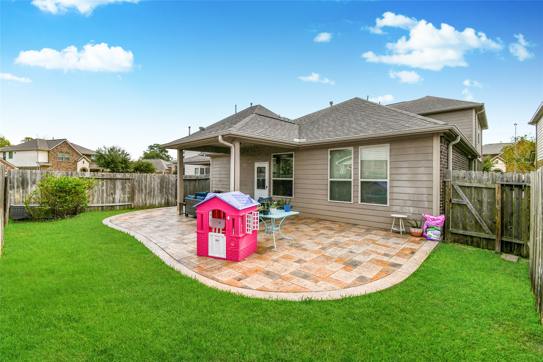 7110 Panther Ridge Drive Spring, TX 77389 - Photo 19 of 25 a front view of a house with yard and green space