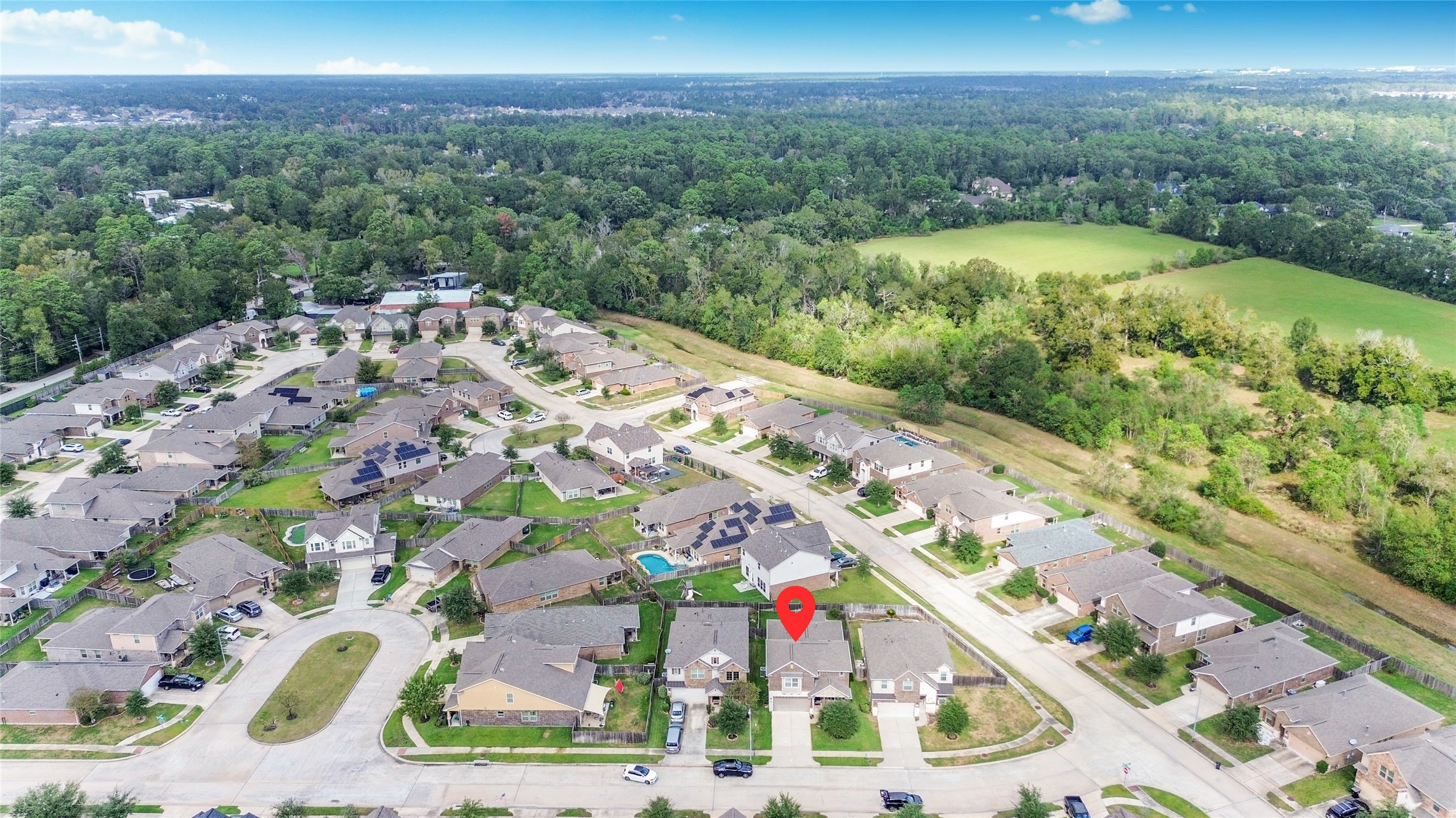 7110 Panther Ridge Drive Spring, TX 77389 - Photo 21 of 24 a view of a city with a lake view