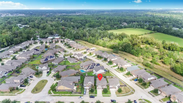 a patio area with table and chairs