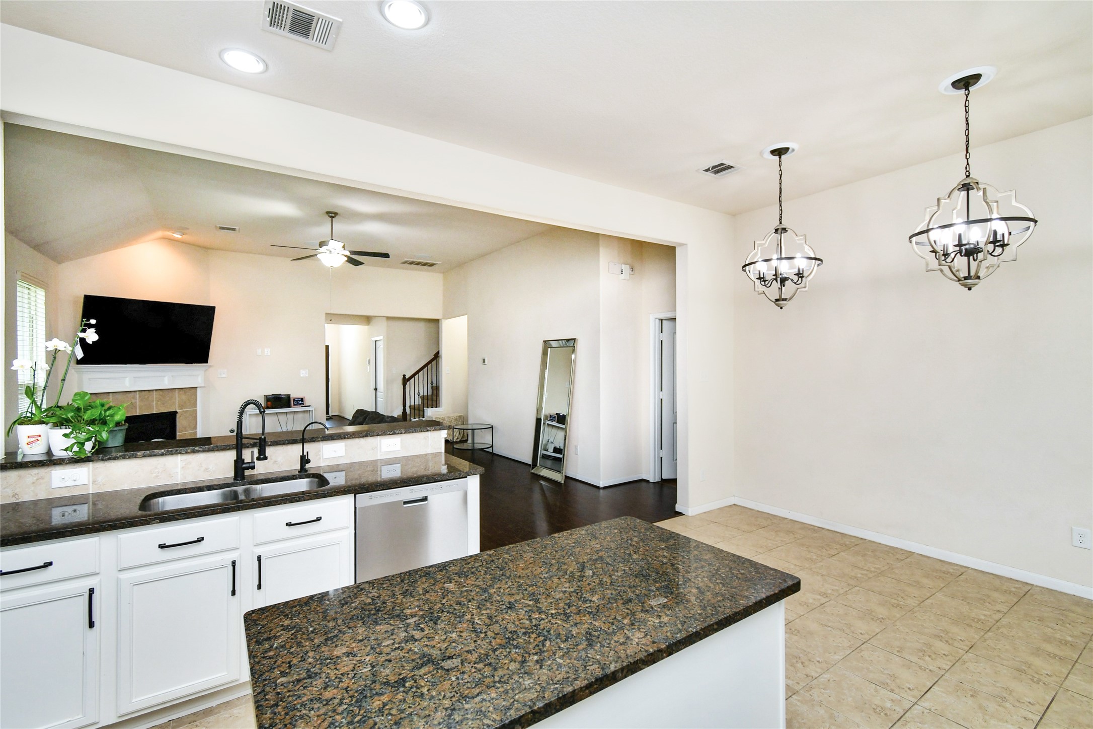 7110 Panther Ridge Drive Spring, TX 77389 - Photo 25 of 25 a view of a kitchen with kitchen island a sink stainless steel appliances and cabinets