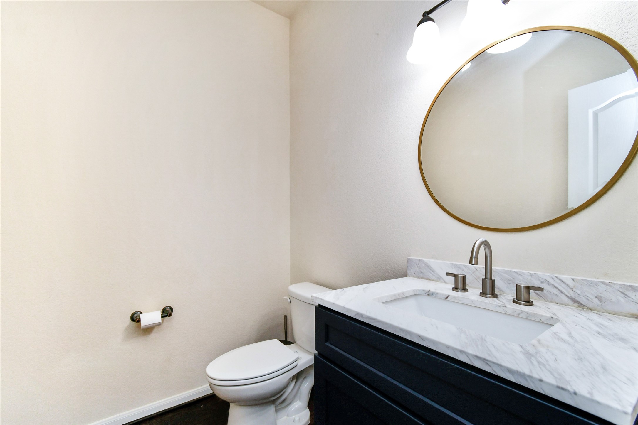 7110 Panther Ridge Drive Spring, TX 77389 - Photo 8 of 24 a bathroom with a granite countertop sink and a mirror
