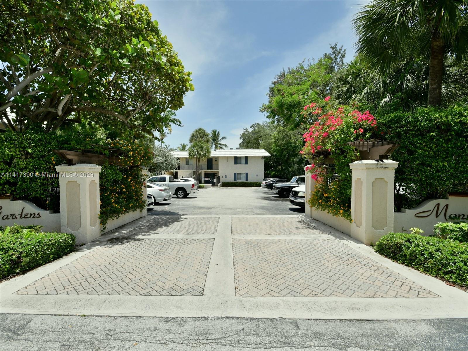 a view of a street with houses