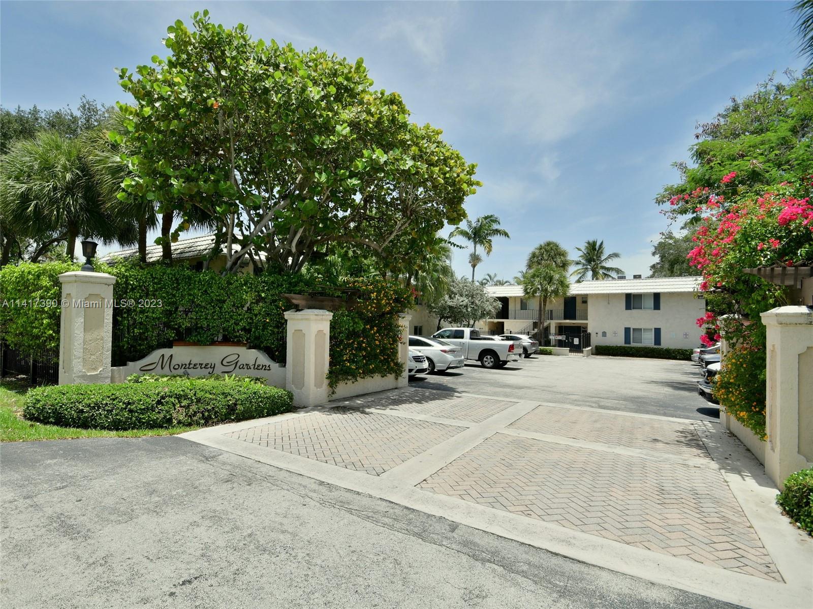8609 Southwest 68th Court, Unit 5 Pinecrest, FL 33156 - Photo 27 of 27 a view of a house with outdoor space and sitting area