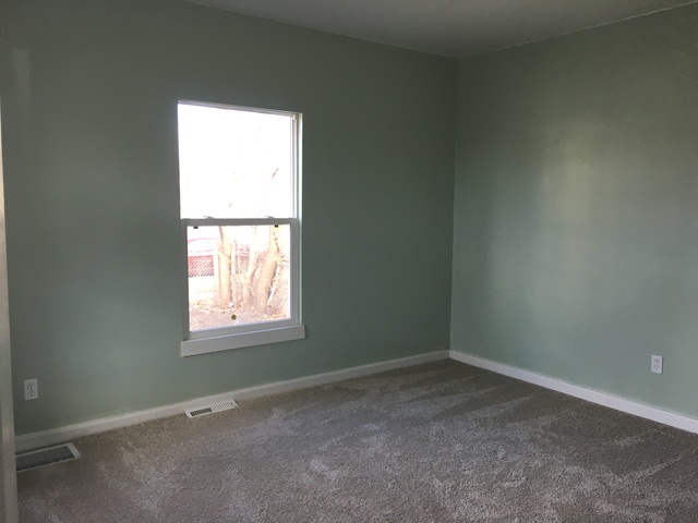 749 Spring Street Aurora, IL 60505 - Photo 12 of 18 an empty room with a window