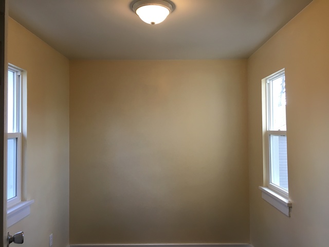 749 Spring Street Aurora, IL 60505 - Photo 9 of 18 a view of a room that has a window in it