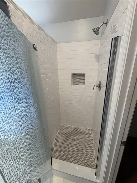 170 Blue Ridge Drive Powder Springs, GA 30127 - Photo 16 of 27 a bathroom with a shower