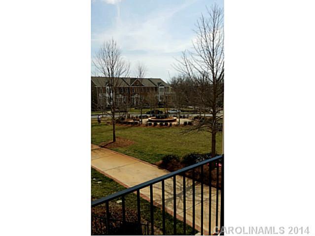 589 6th Baxter Crossing, Unit 5 Fort Mill, SC 29708 - Photo 2 of 12 a balcony with mountain view