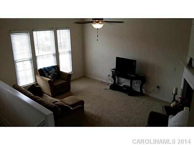 589 6th Baxter Crossing, Unit 5 Fort Mill, SC 29708 - Photo 3 of 12 a black and white photo of a living room