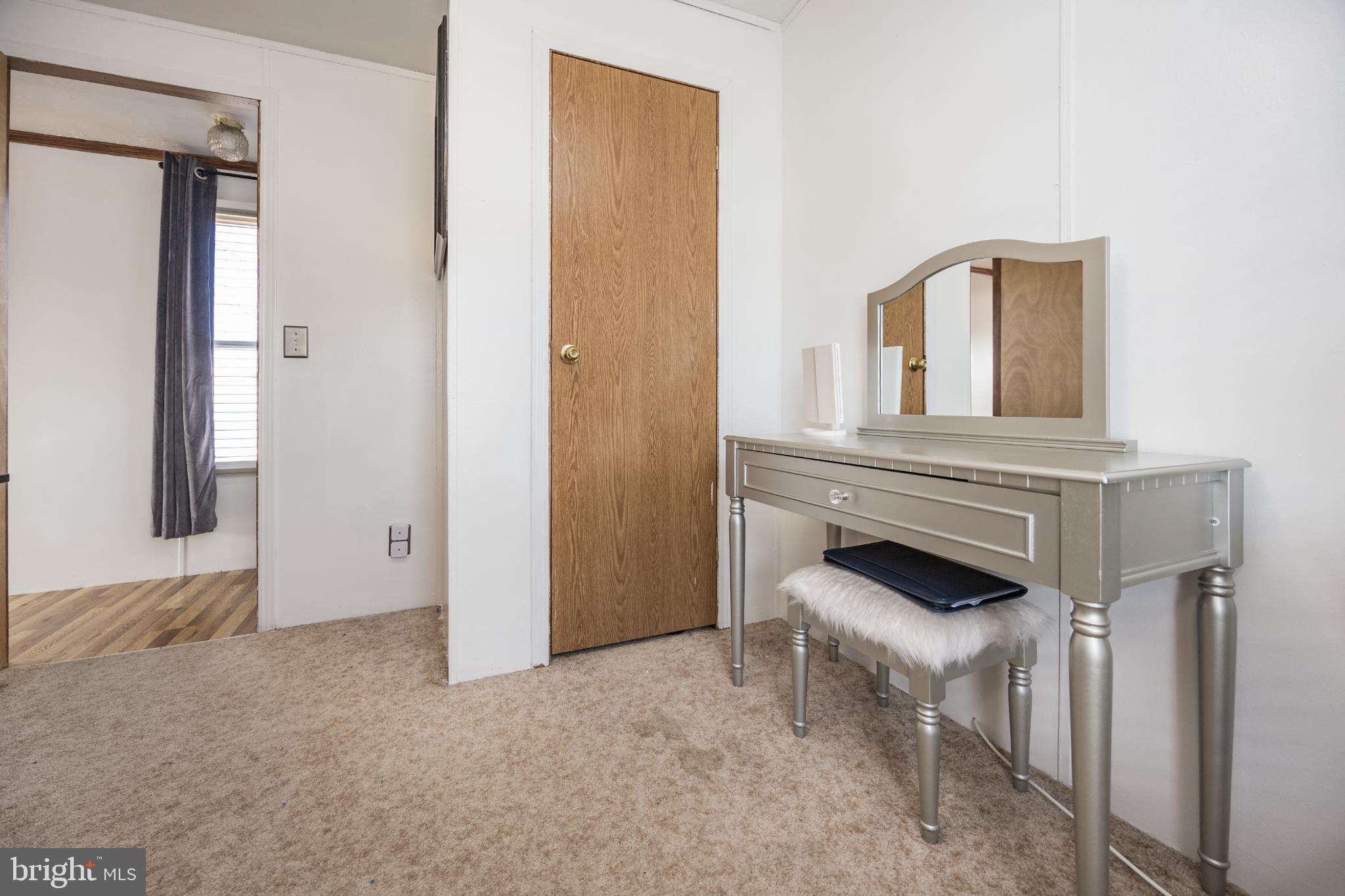 103 Herbert Court Bear, DE 19701 - Photo 33 of 33 a view of a livingroom with furniture and staircase