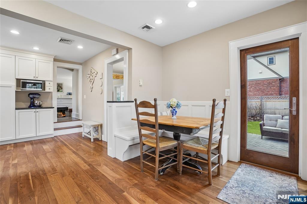 25 Bowers Road Caldwell, NJ 07006 - Photo 11 of 37 a view of a dining room with furniture window and wooden floor