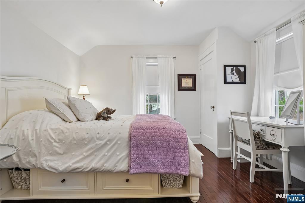 25 Bowers Road Caldwell, NJ 07006 - Photo 20 of 37 a bed room with a bed and a table