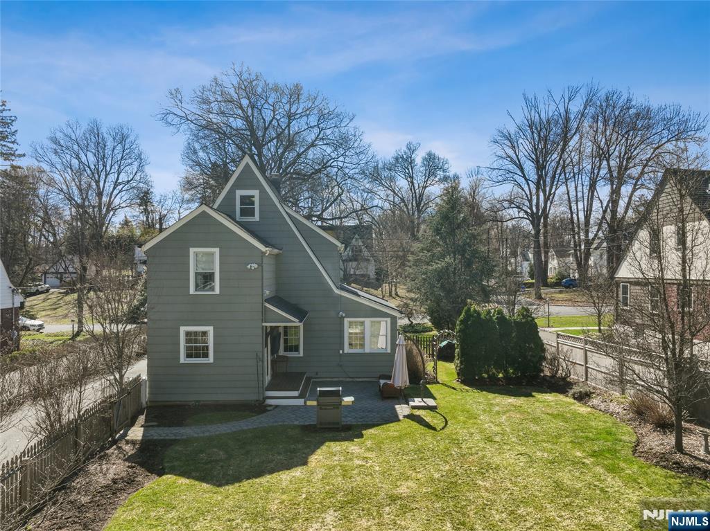 25 Bowers Road Caldwell, NJ 07006 - Photo 31 of 37 a view of a yard in front of a house with a large tree