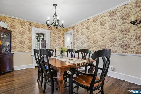 a kitchen with a stove a sink and a refrigerator