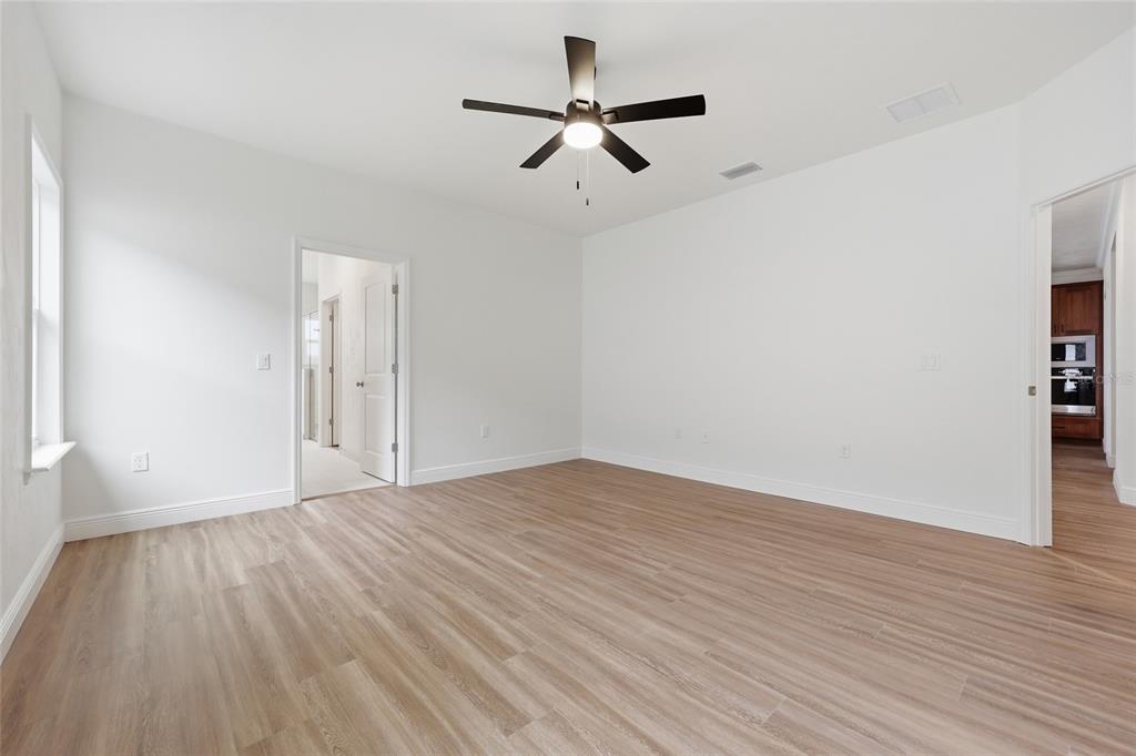 6735 Southwest 10th Lane Gainesville, FL 32607 - Photo 11 of 24 a view of empty room with wooden floor