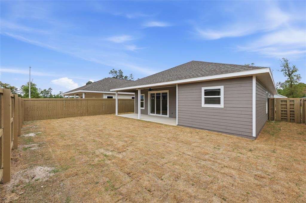 6735 Southwest 10th Lane Gainesville, FL 32607 - Photo 21 of 24 a house with yard in front of it