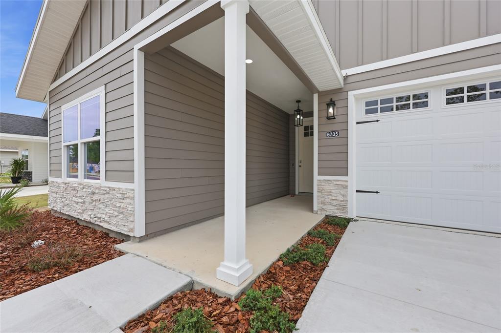 6735 Southwest 10th Lane Gainesville, FL 32607 - Photo 22 of 24 a view of a house with garage