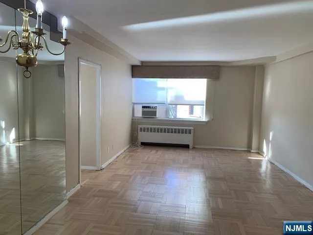 a view of a room with a large window