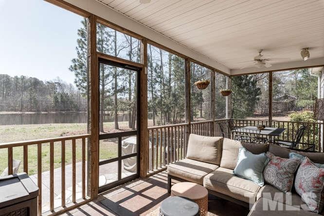 279 Gay Road Zebulon, NC 27597 - Photo 22 of 25 a balcony with furniture and a large window