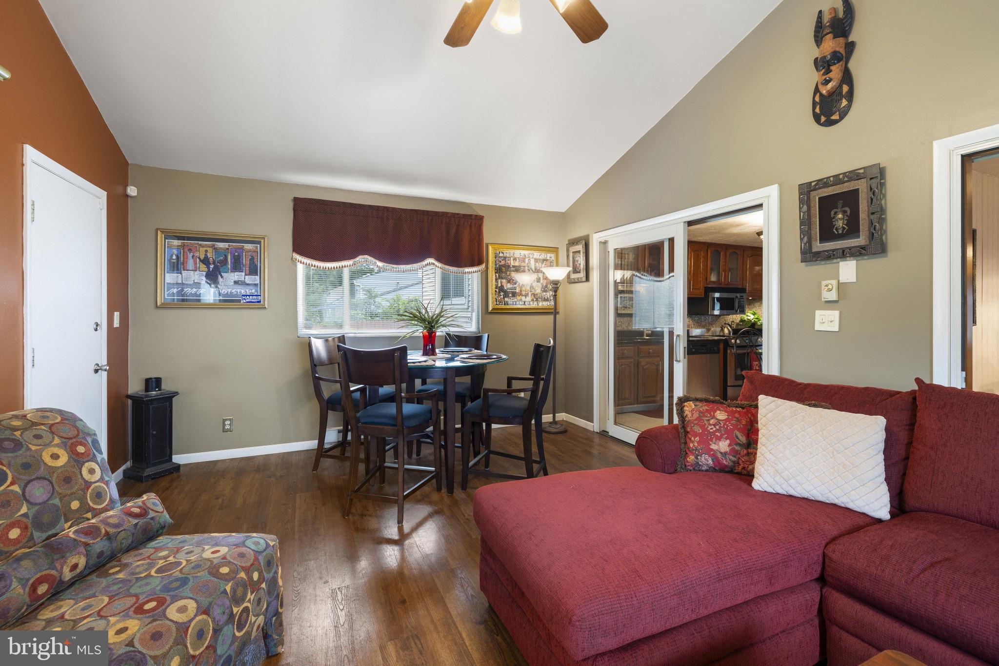 4105 Hanwell Road Randallstown, MD 21133 - Photo 14 of 37 a living room with furniture and wooden floor