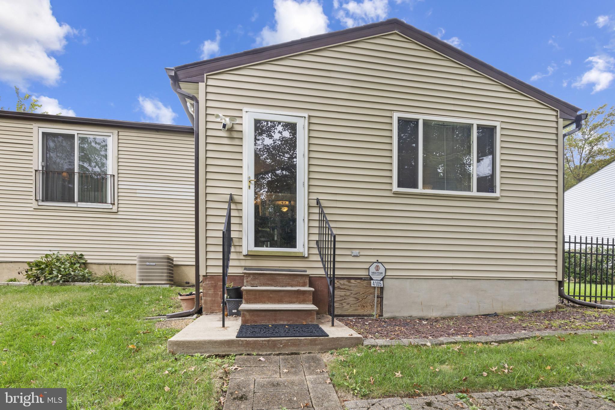 4105 Hanwell Road Randallstown, MD 21133 - Photo 32 of 37 a front view of a house with a yard