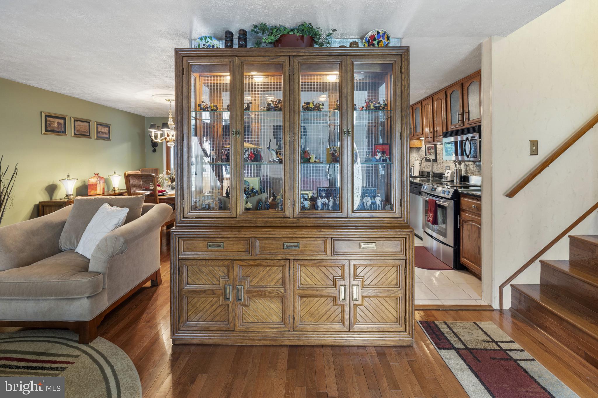 4105 Hanwell Road Randallstown, MD 21133 - Photo 6 of 37 a living room with furniture and a fireplace