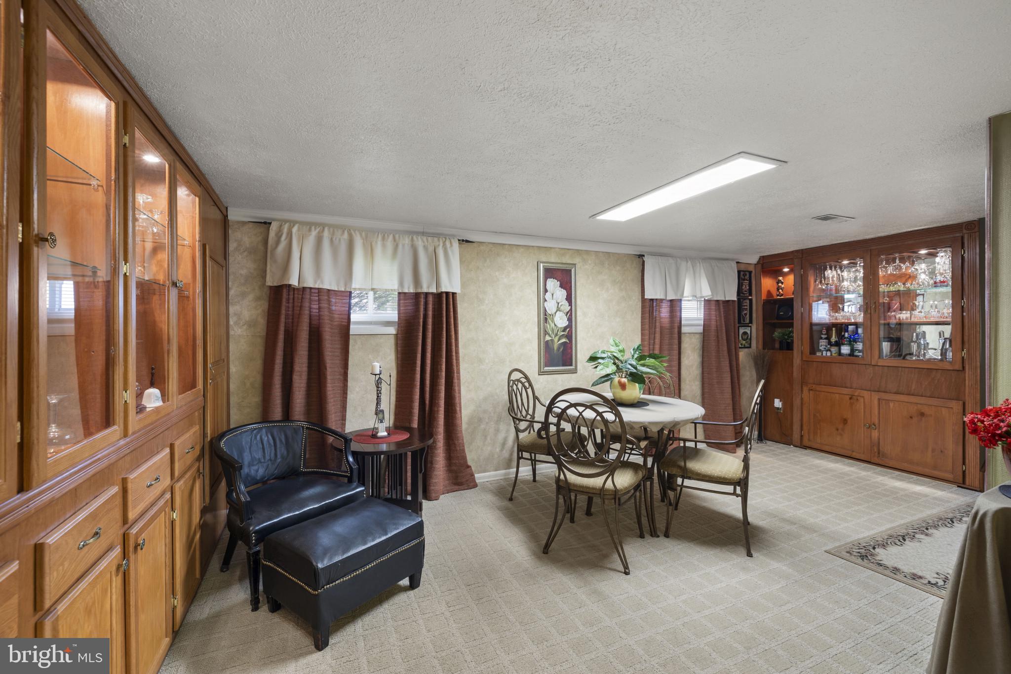 4105 Hanwell Road Randallstown, MD 21133 - Photo 9 of 37 a living room with furniture and a large window