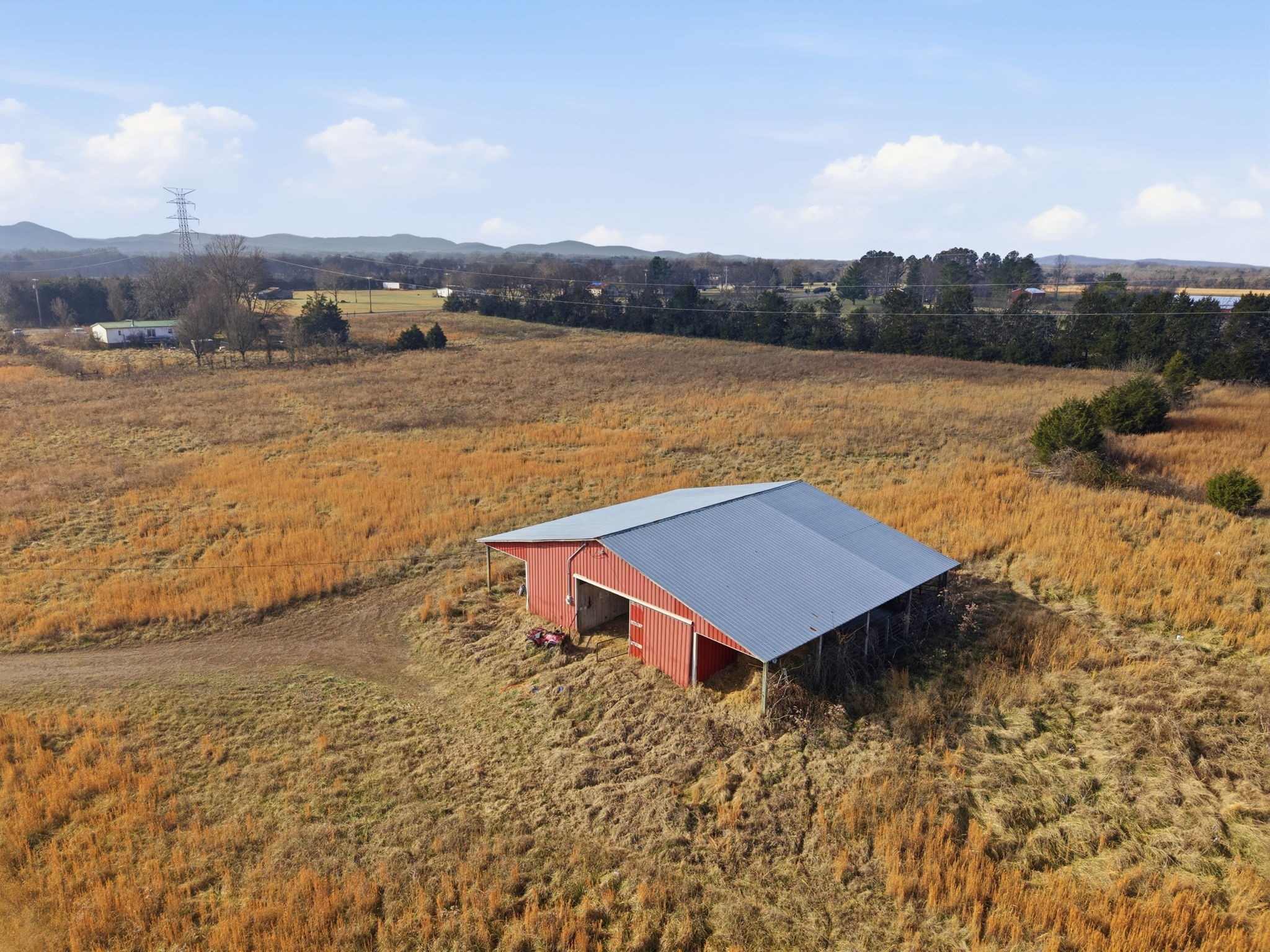 4689 Sledge Road Christiana, TN 37037 - Photo 2 of 32 a view of a lake with a mountain view