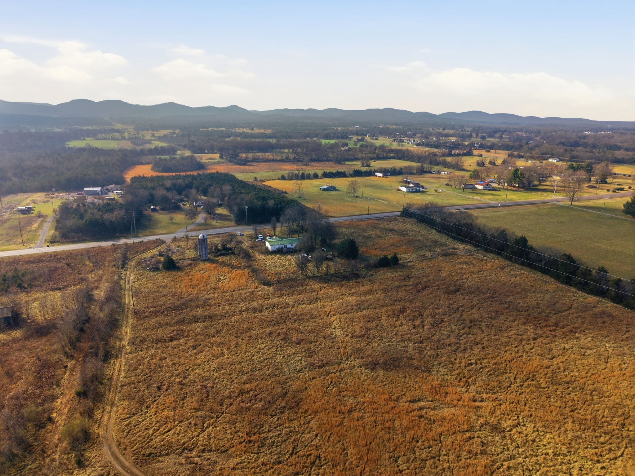 4689 Sledge Road Christiana, TN 37037 - Photo 25 of 32 a view of a lake with mountains in the background
